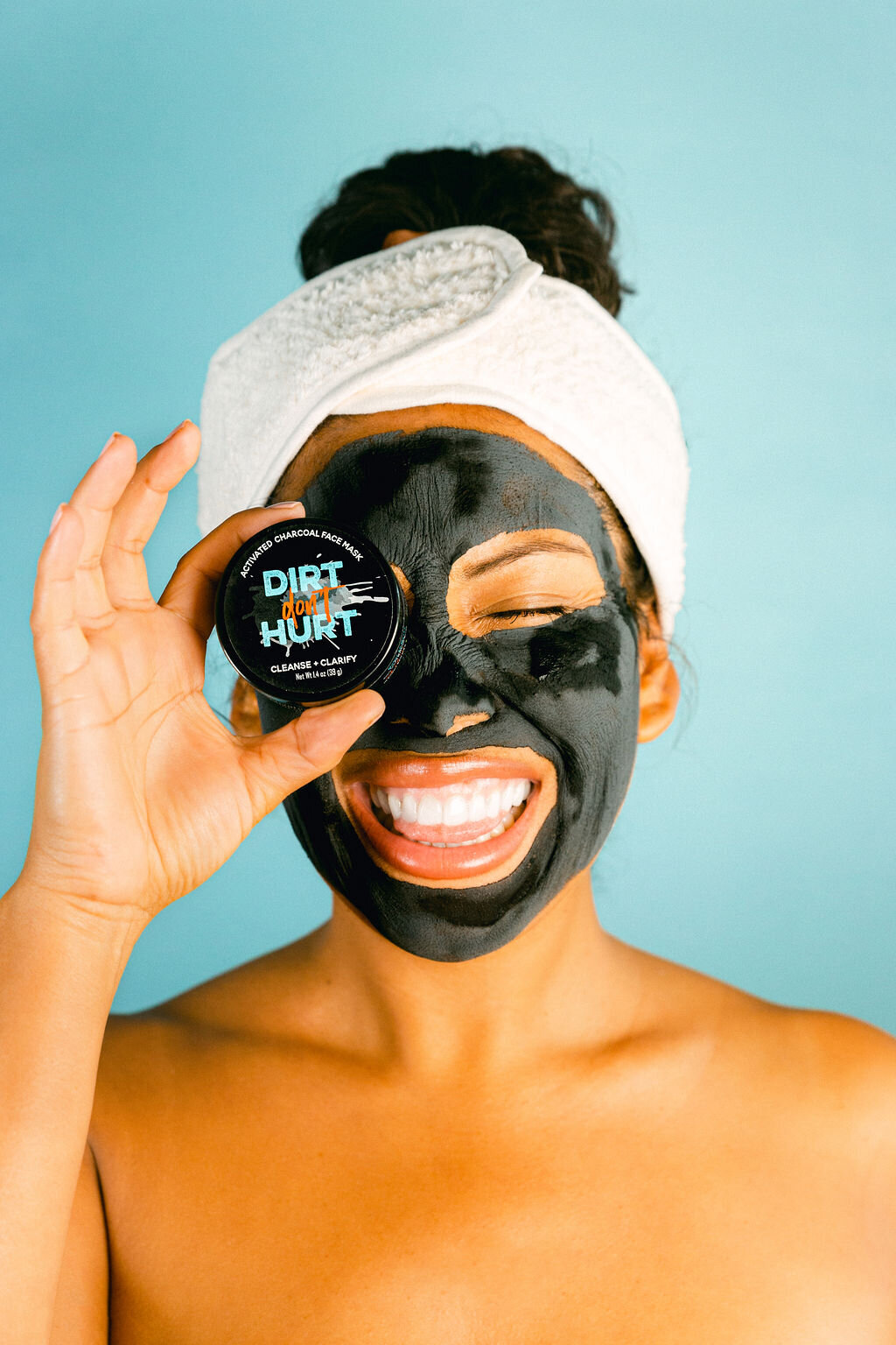 Turquoise Backdrop black woman in charcoal mask spa day for small business Dirt don't Hurt