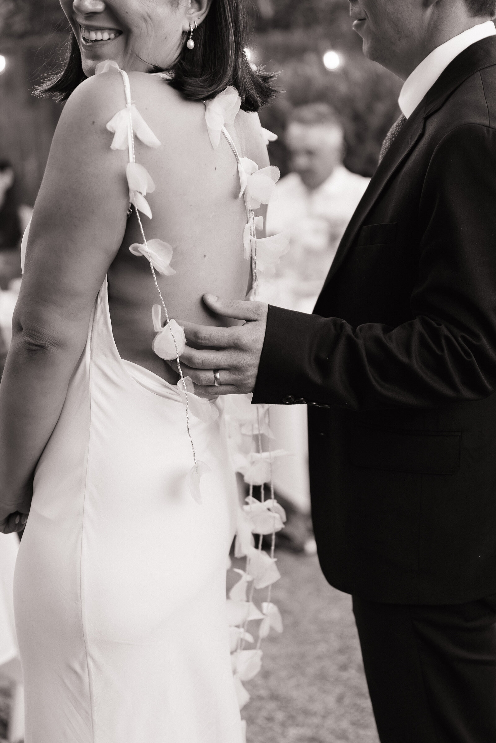 Close up of bride and groom embracing by Erica Rochelle, Northern California wedding photographer