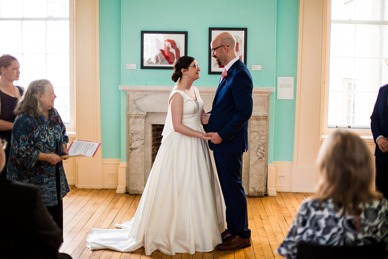 Bride and groom exchange vows at Erie Art Museum