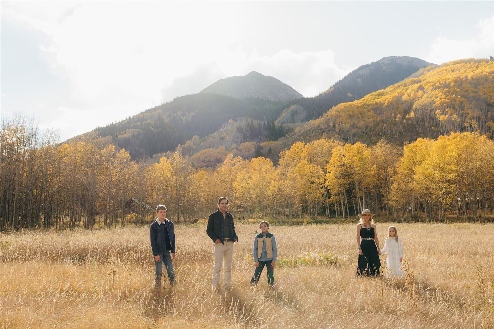Authentic candid family photography in Aspen — child’s playful moment styled in elevated mountain fashion.
