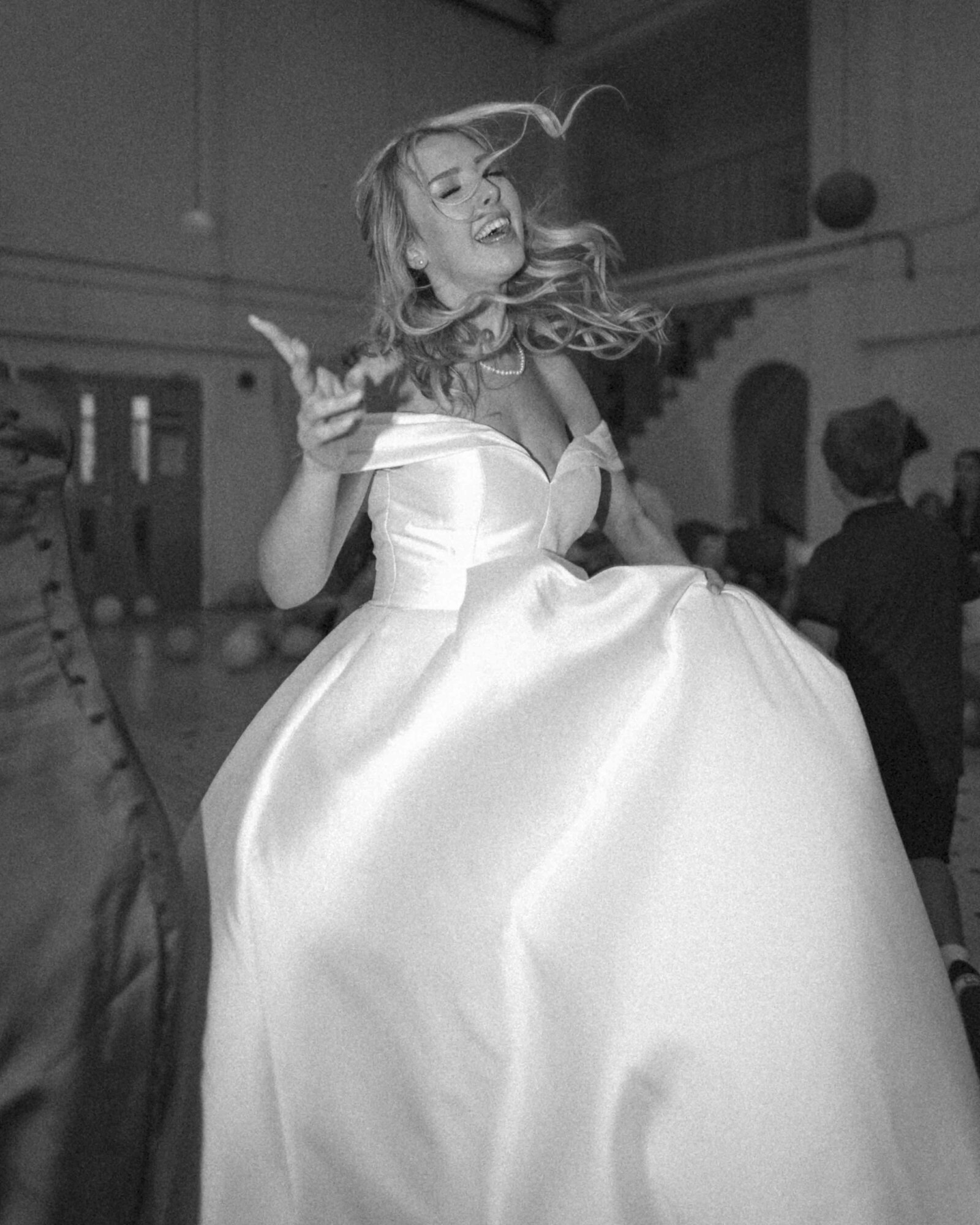 black and white with flash bride dancing