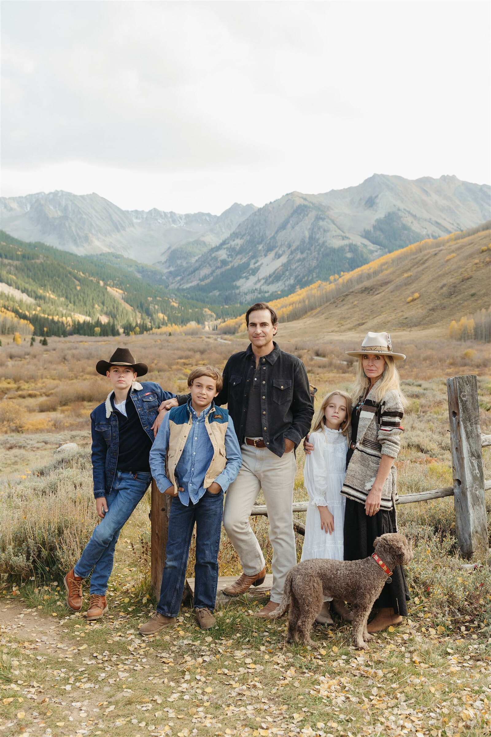 Editorial Aspen family photography — stylish family walking together in classic Ralph Lauren–inspired outfits.