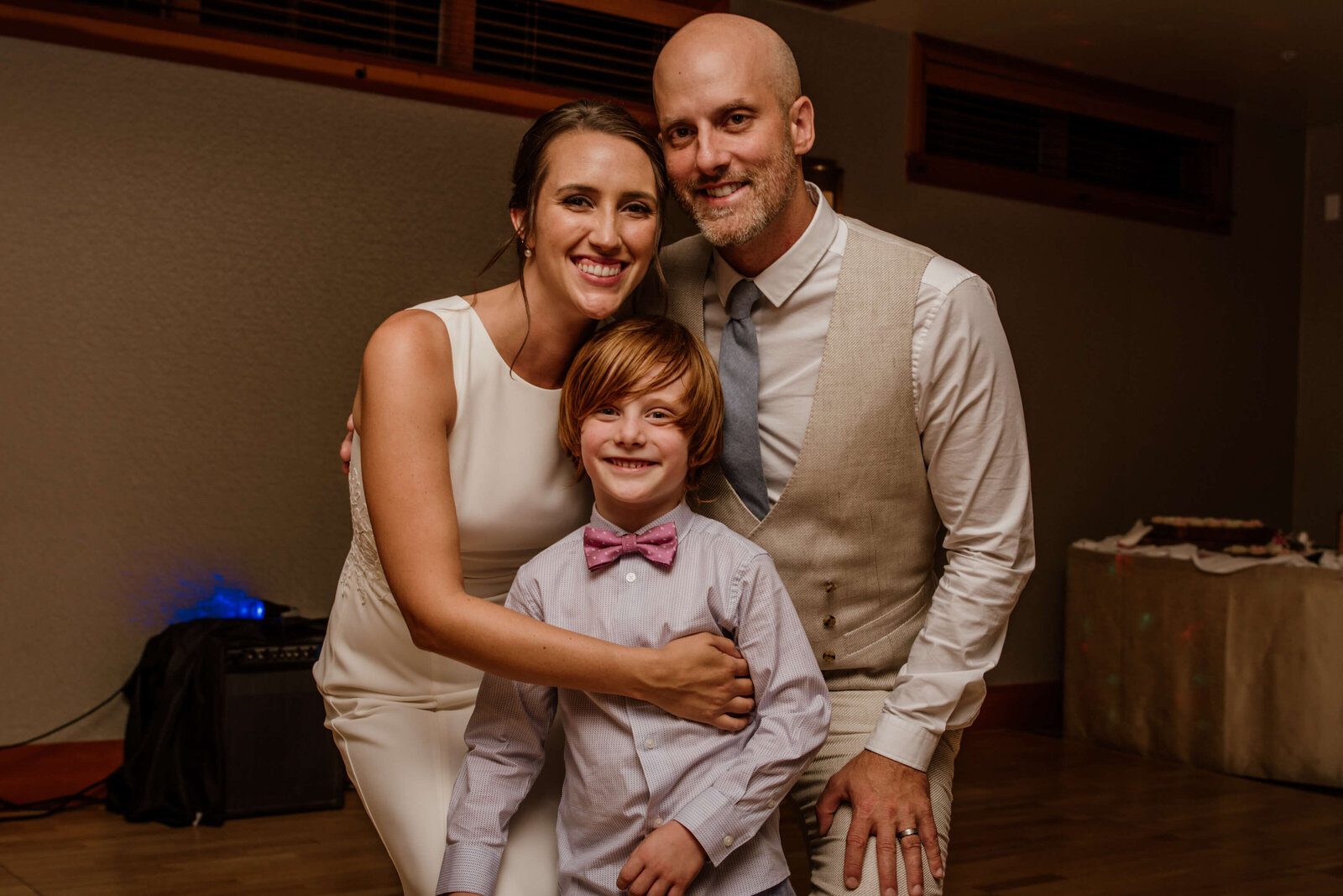 Happy family at wedding reception.