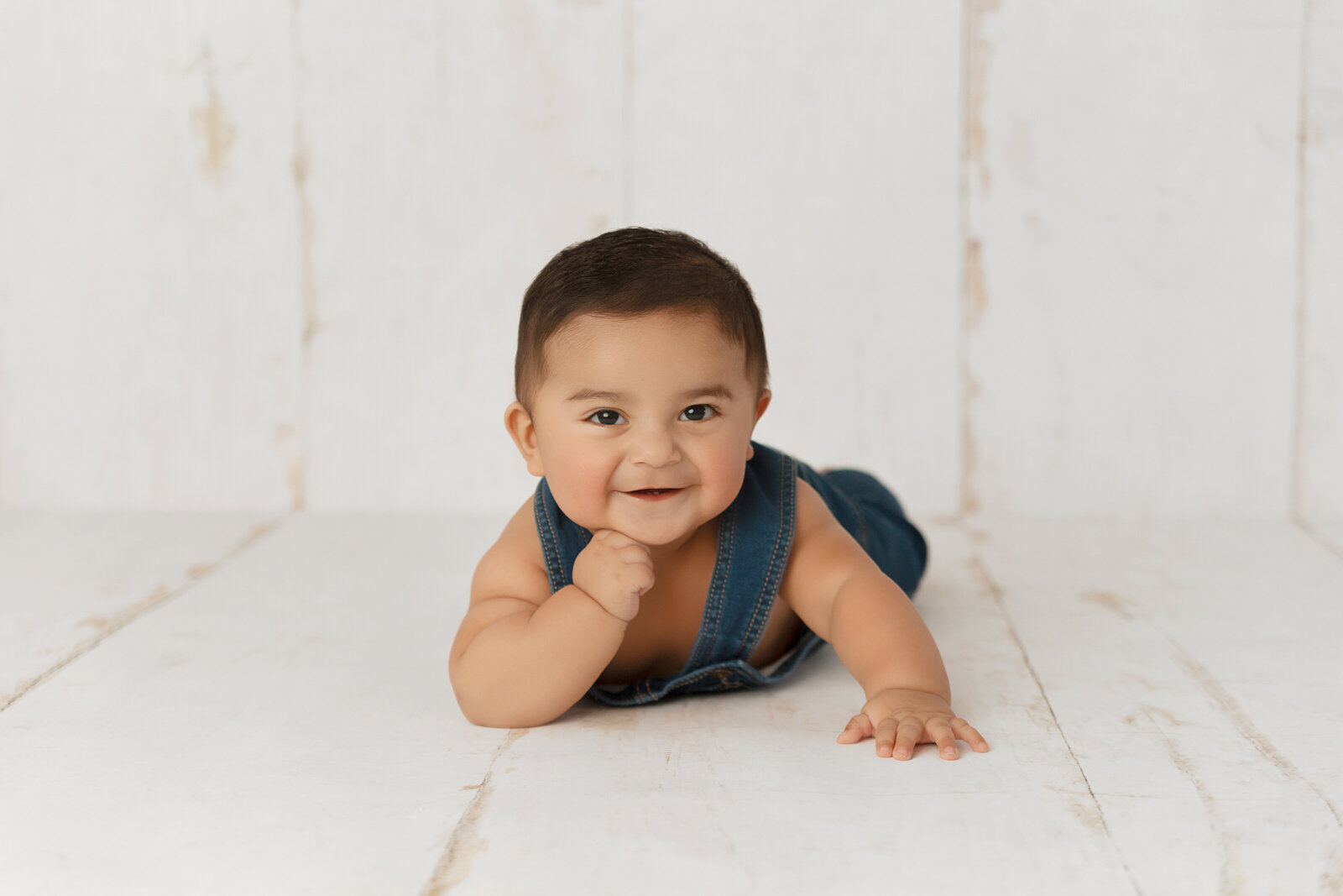 mexican little boy smiling and posing for the camera