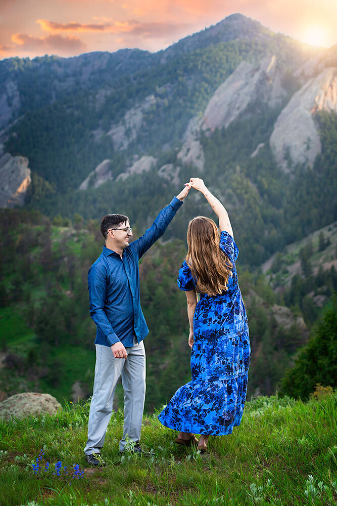 slow-dancing-mountain-hill-top-colorado-stunning-view-boulder-NCAR-engagement-couple-romantic-dreamy-sound-of-music-dip