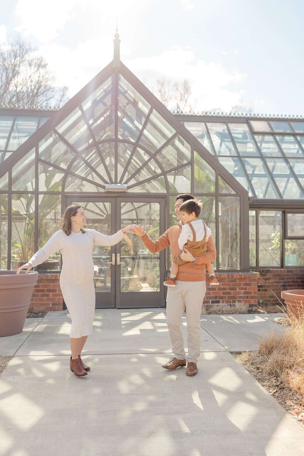 mom and dad dancing during maternity photos in Reston, VA