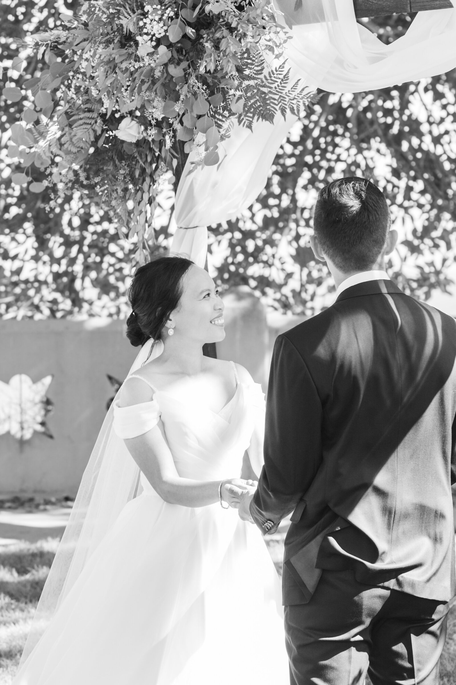 A wedding ceremony underneath a large tree in Los Angeles, Ca.