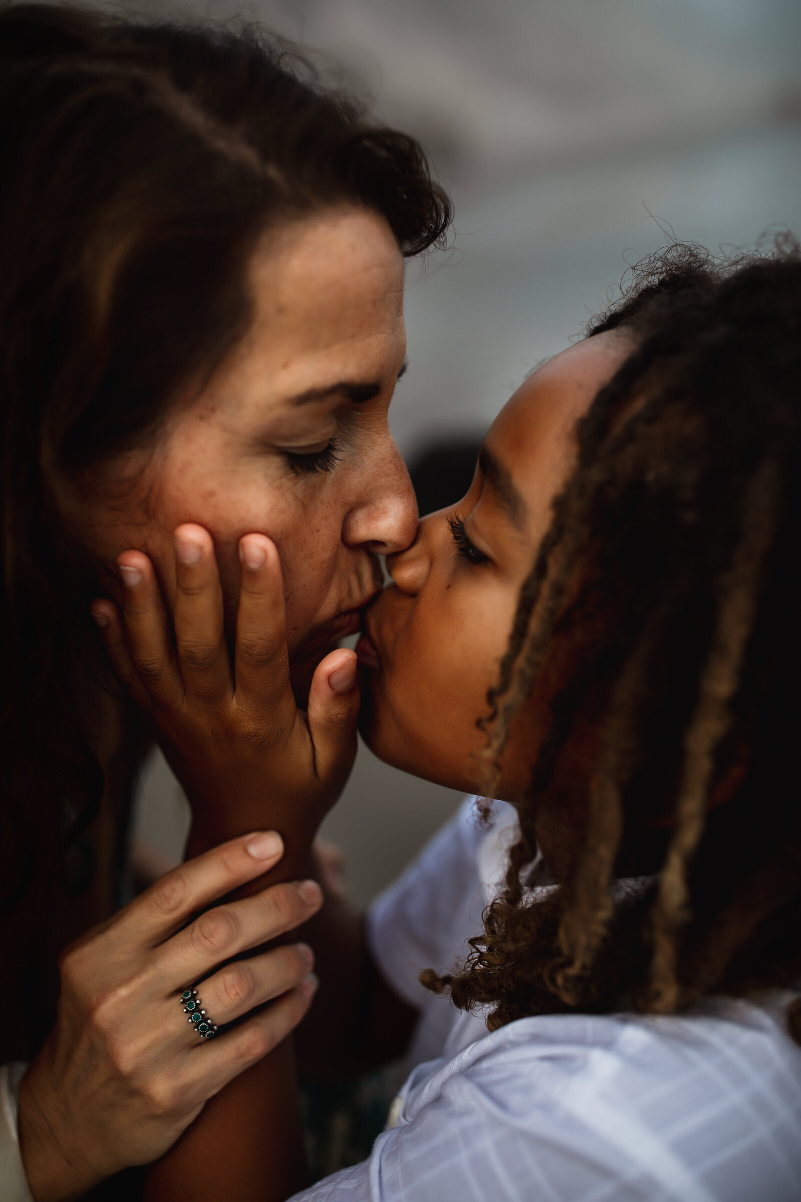 untitled-201003-902-Edit-2mama-son-kiss-tender-moment-hand-on-cheek-carpinteria