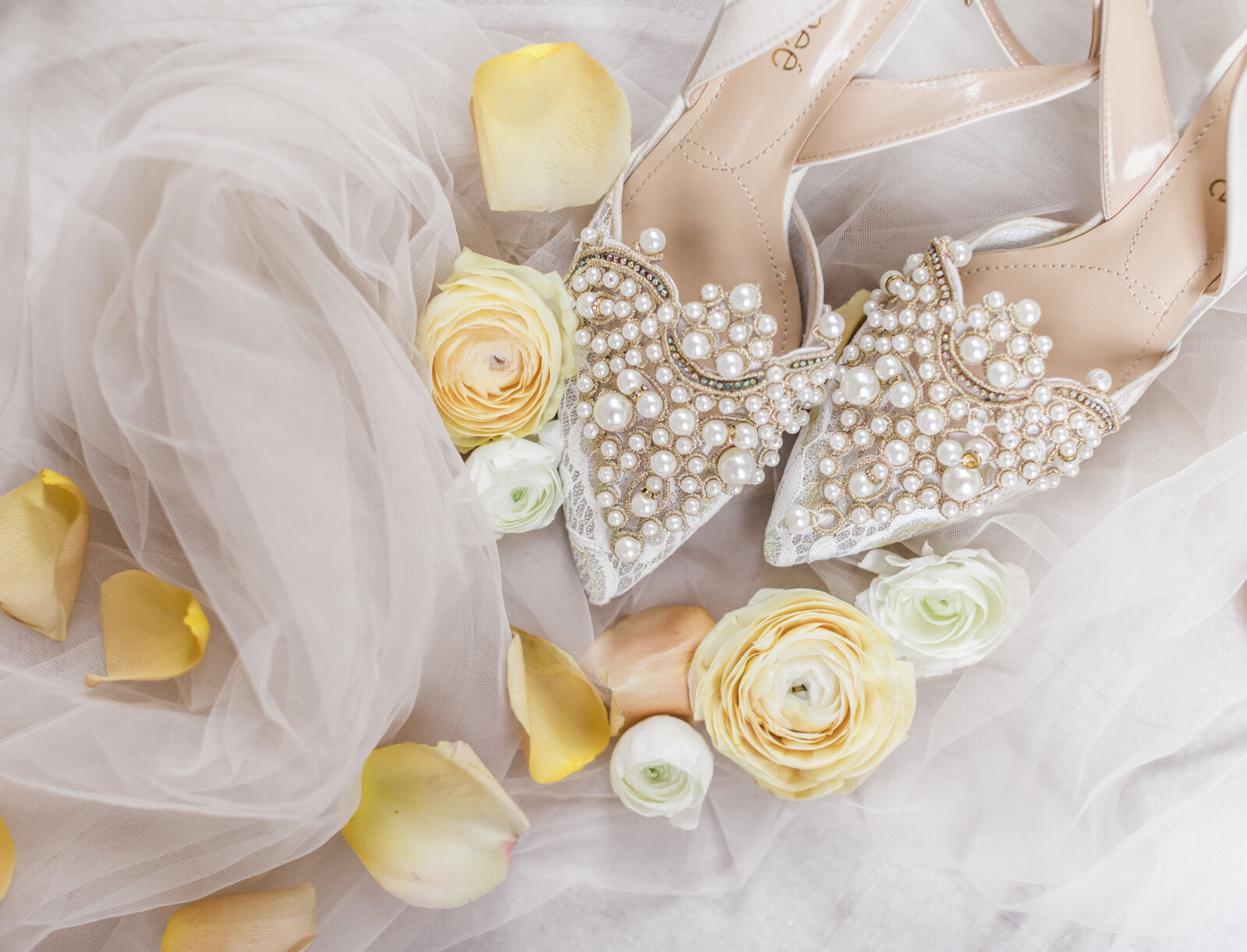 Classy High heels surrounded by yellow flowers