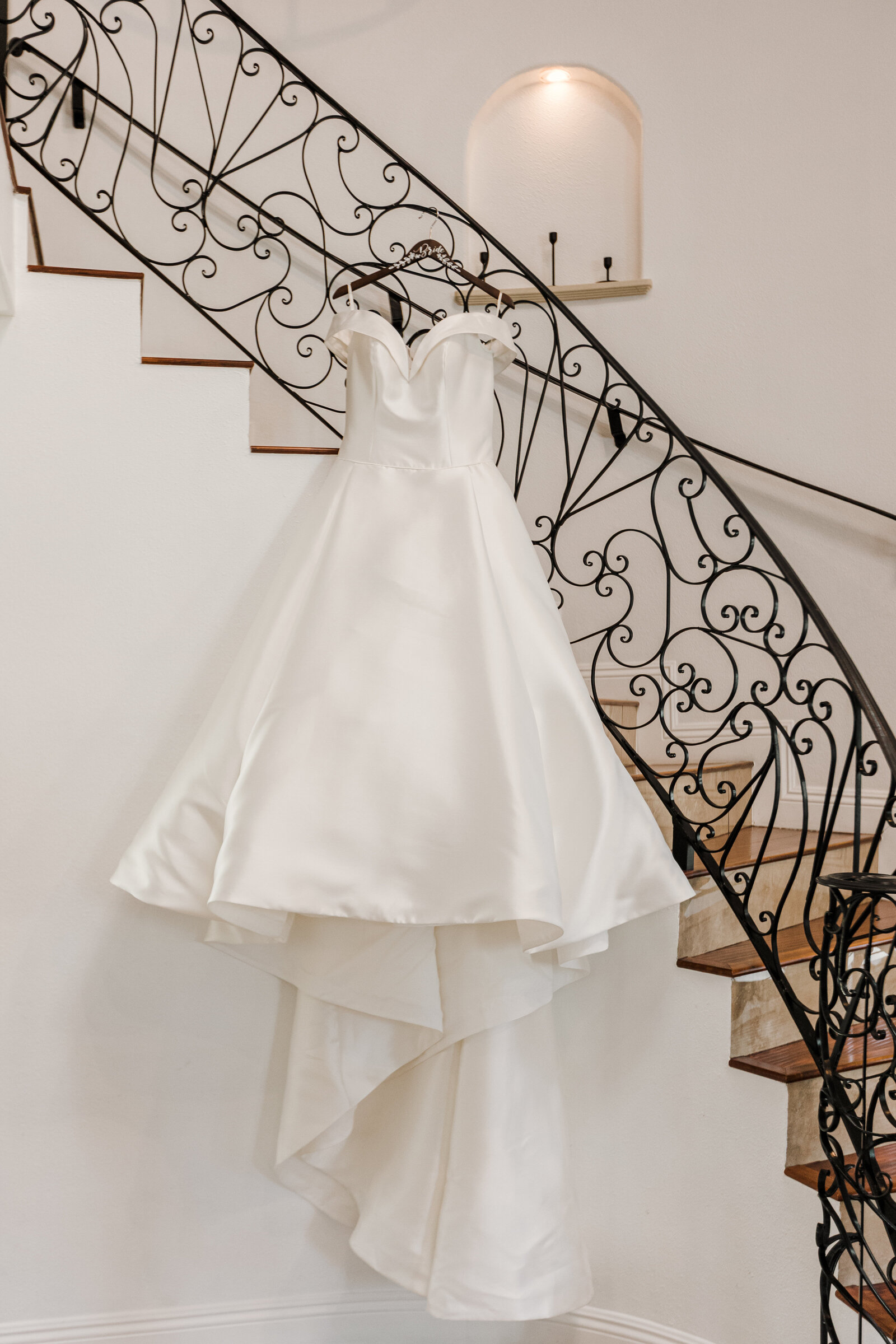 Wedding Dress details on a stair case in Santa Ana Ca