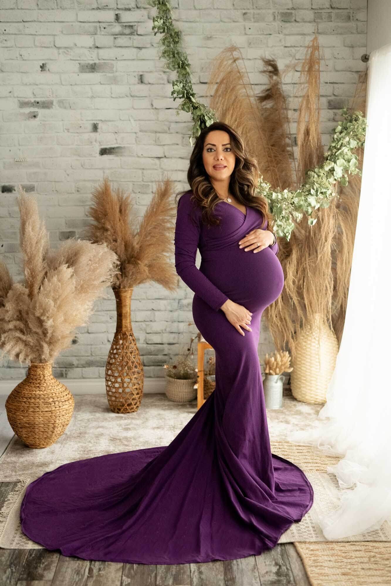 Maternity photo shoot with purple tulip gown