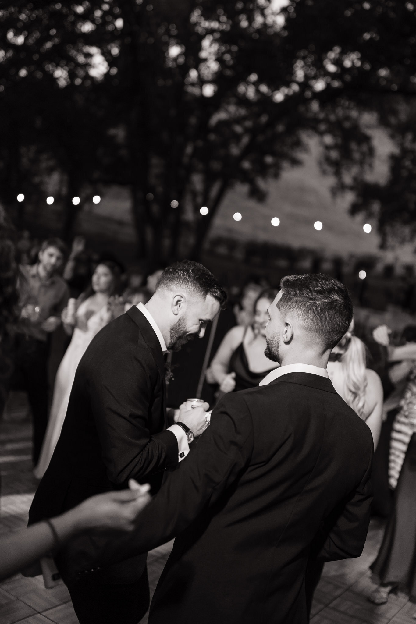 Grooms on dance floor by Erica Rochelle photography, best Northern California wedding photographers