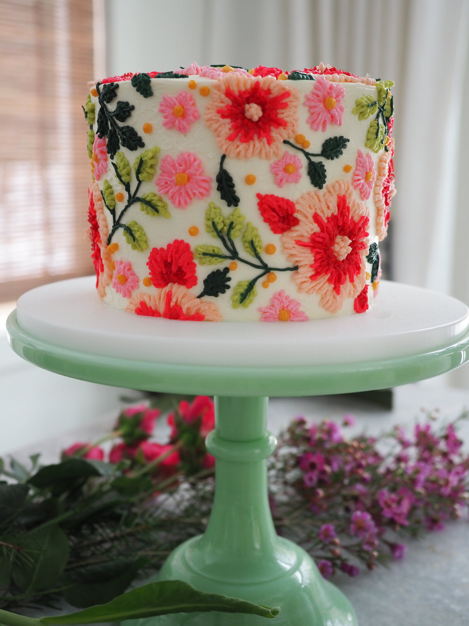 textile inspired floral buttercream cake