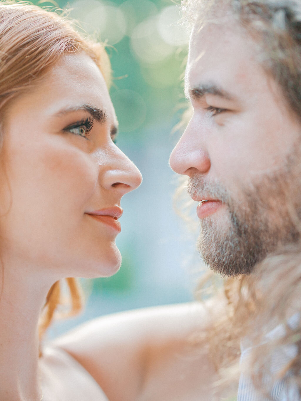 Bride looks lovingly into groom's eyes