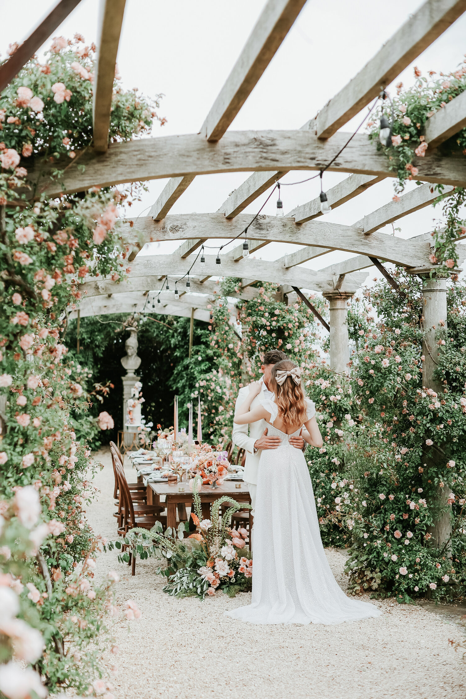 Euridge-Manor-wedding-couple-standing-next-to-table