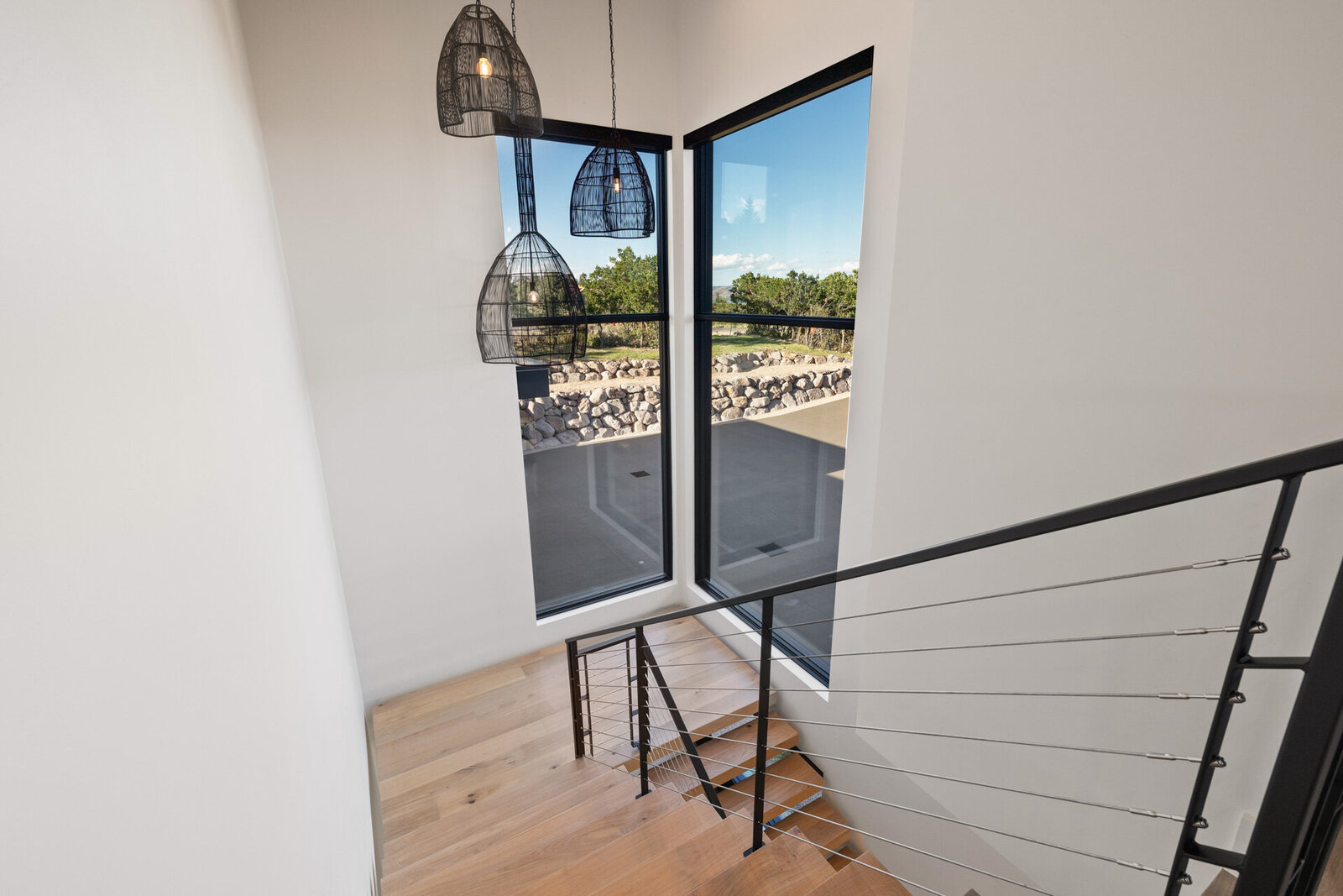 Chalet-and-Co-Park-City-Interior-Designer-staircase-hanging-lights