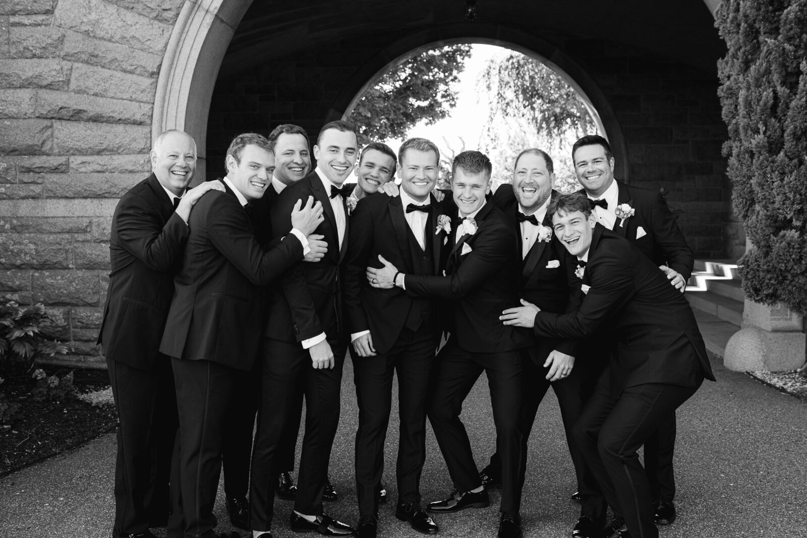 playful groomsmen portrait