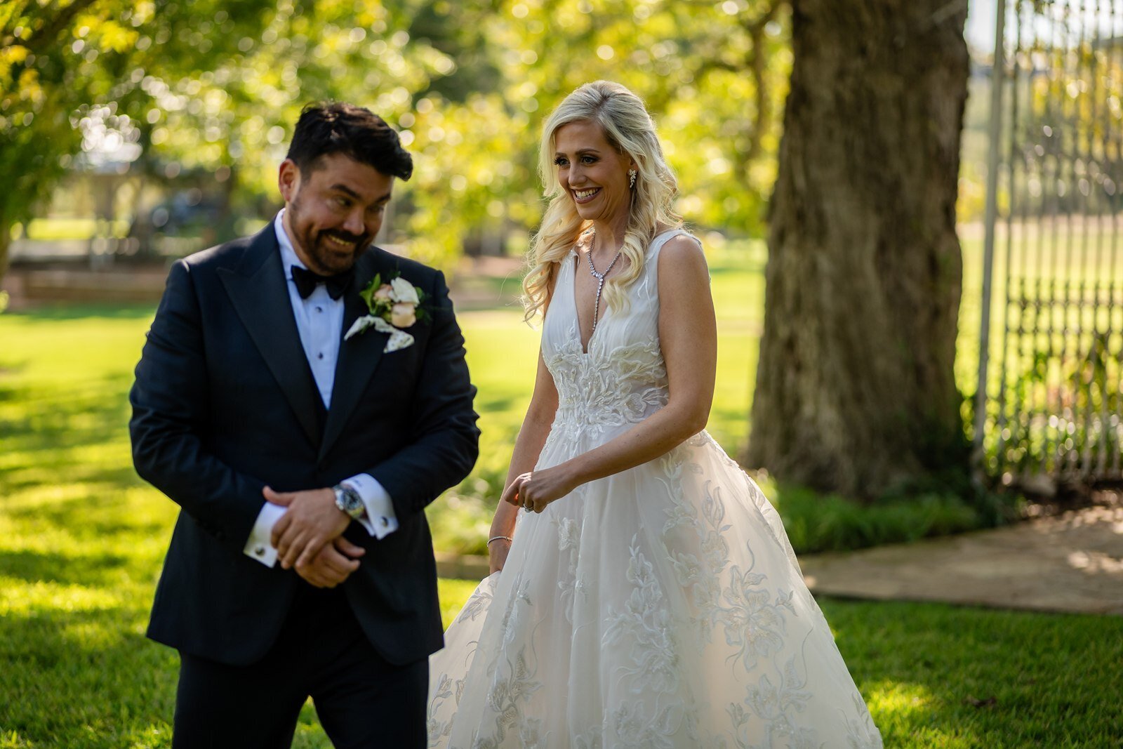 bride-groom-laughing-before-texas-wedding