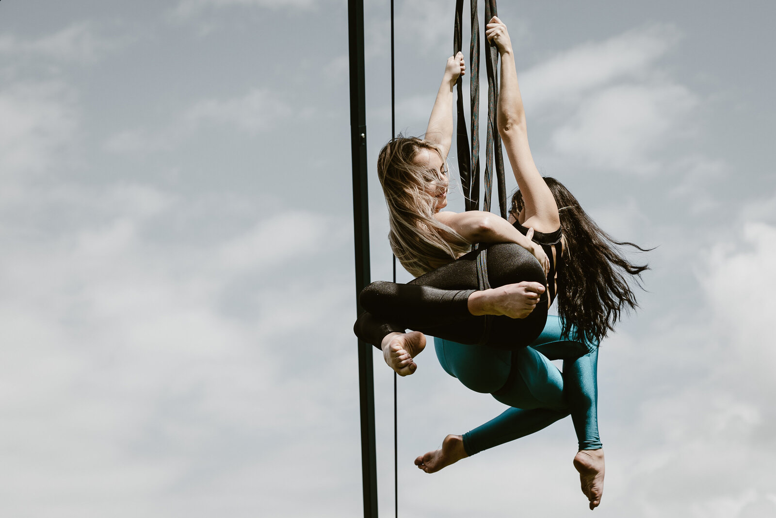 Aerialist duo shot in natural light