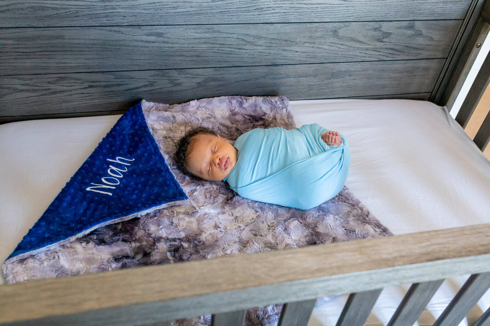A baby boy in his crib in his Woodbridge home.
