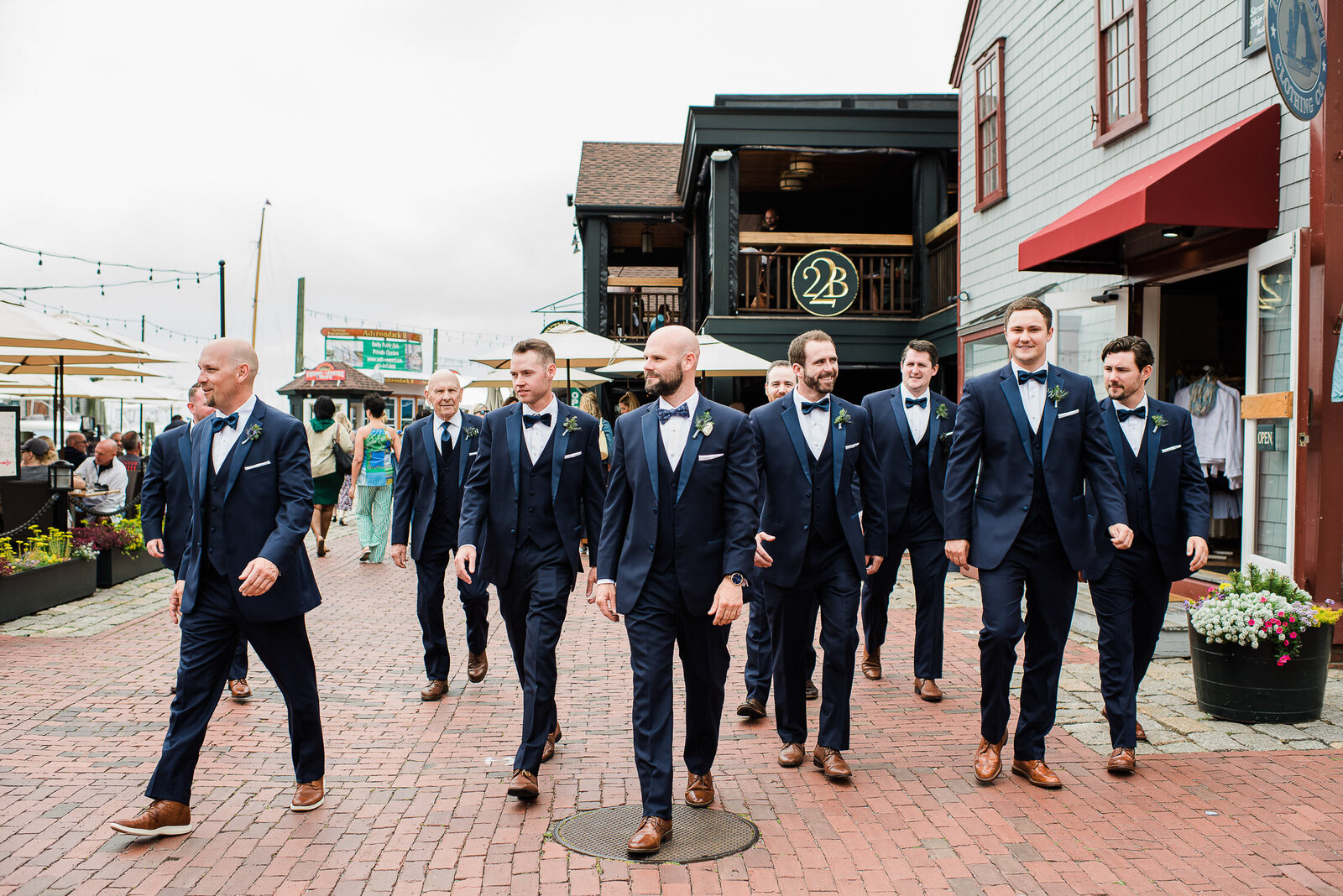 groomsmen walking in Newport