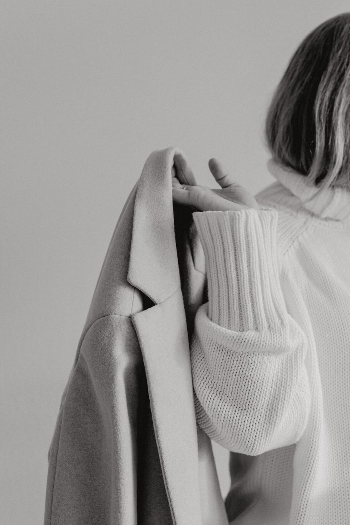 kaboompics_woman-in-white-sweater-beige-wool-jacket-29436