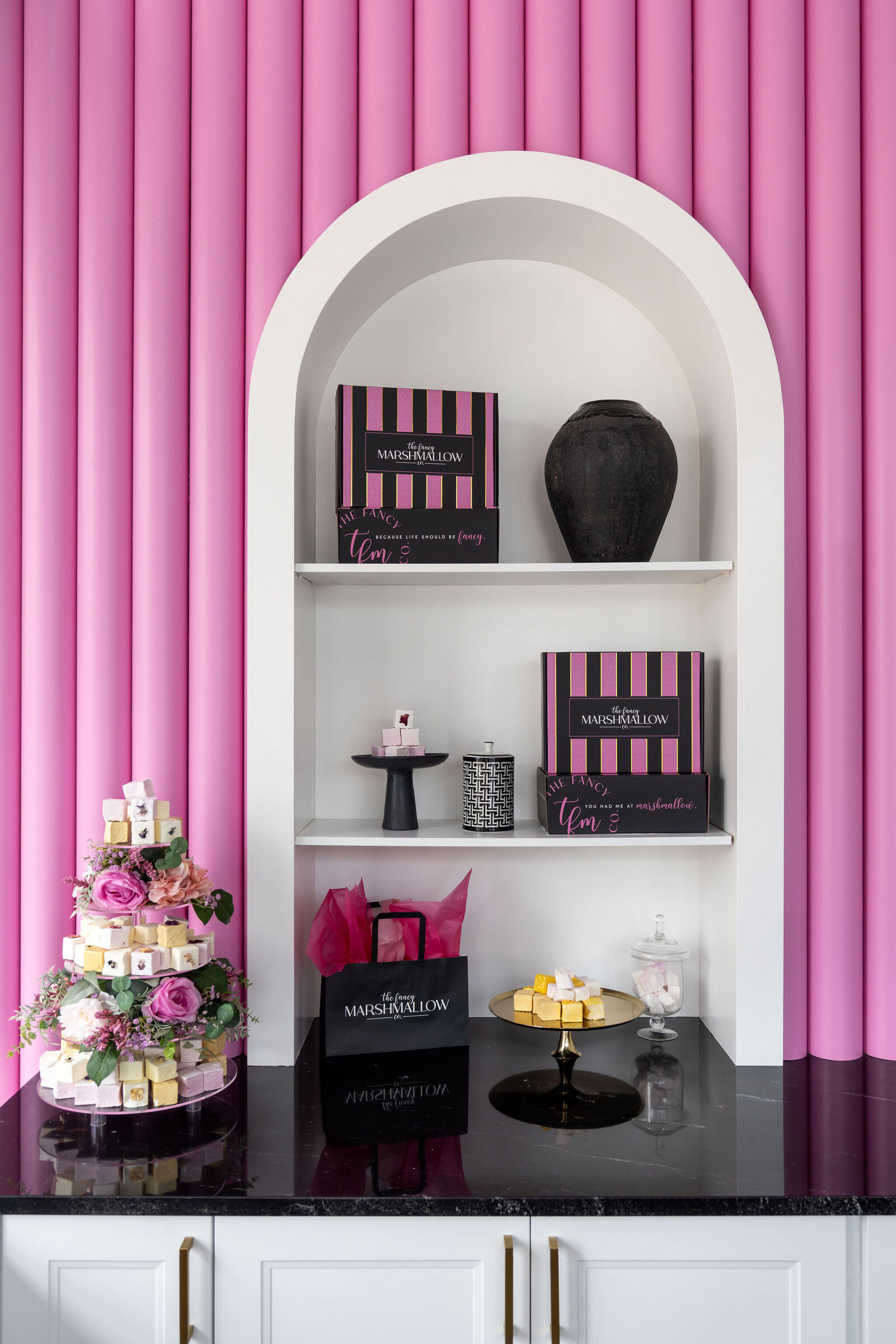 Nuela_Designs_White_Arched_Retail_Display_Pink_Wall