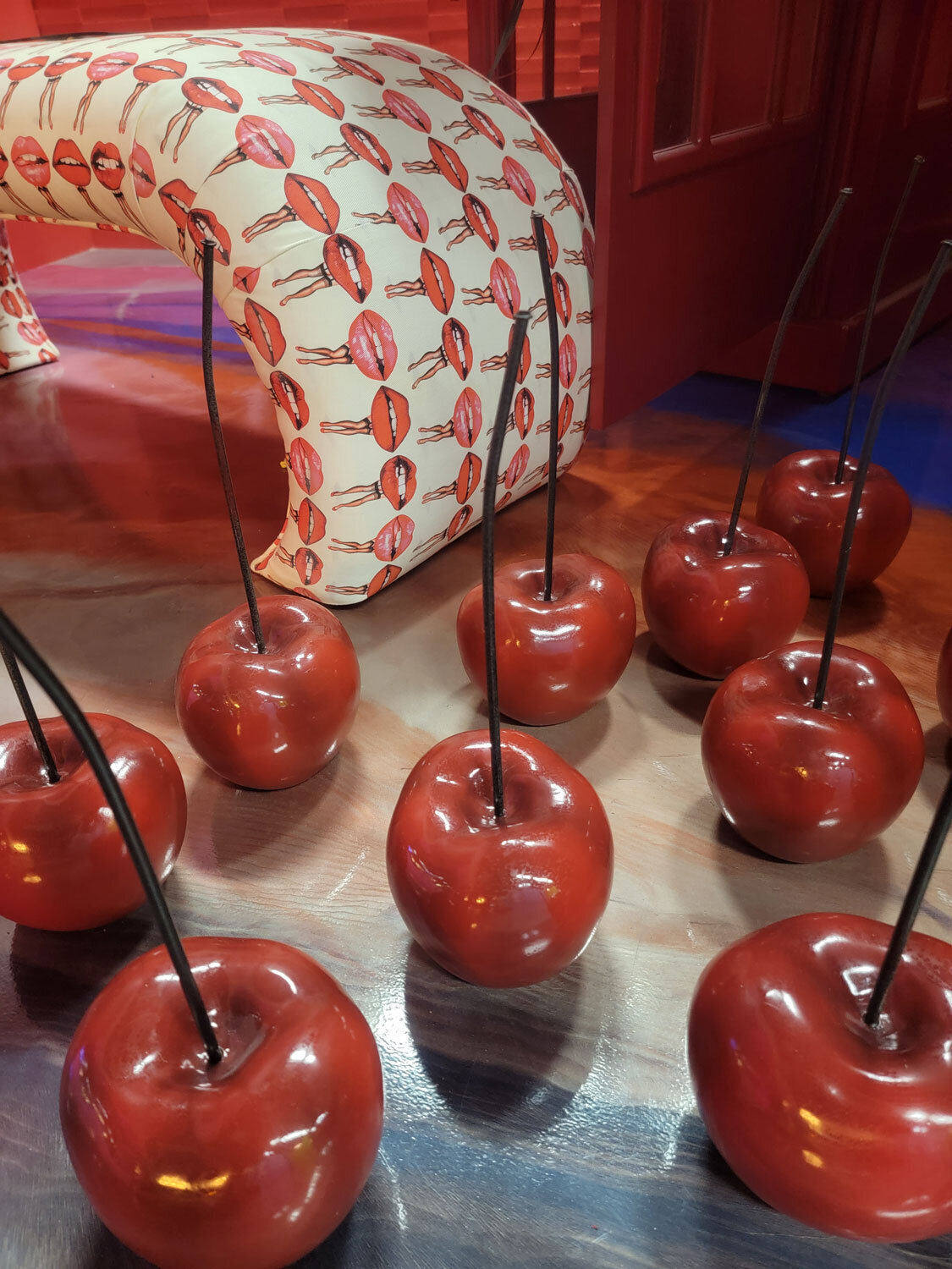 Cool life sized cherries and blow up bench