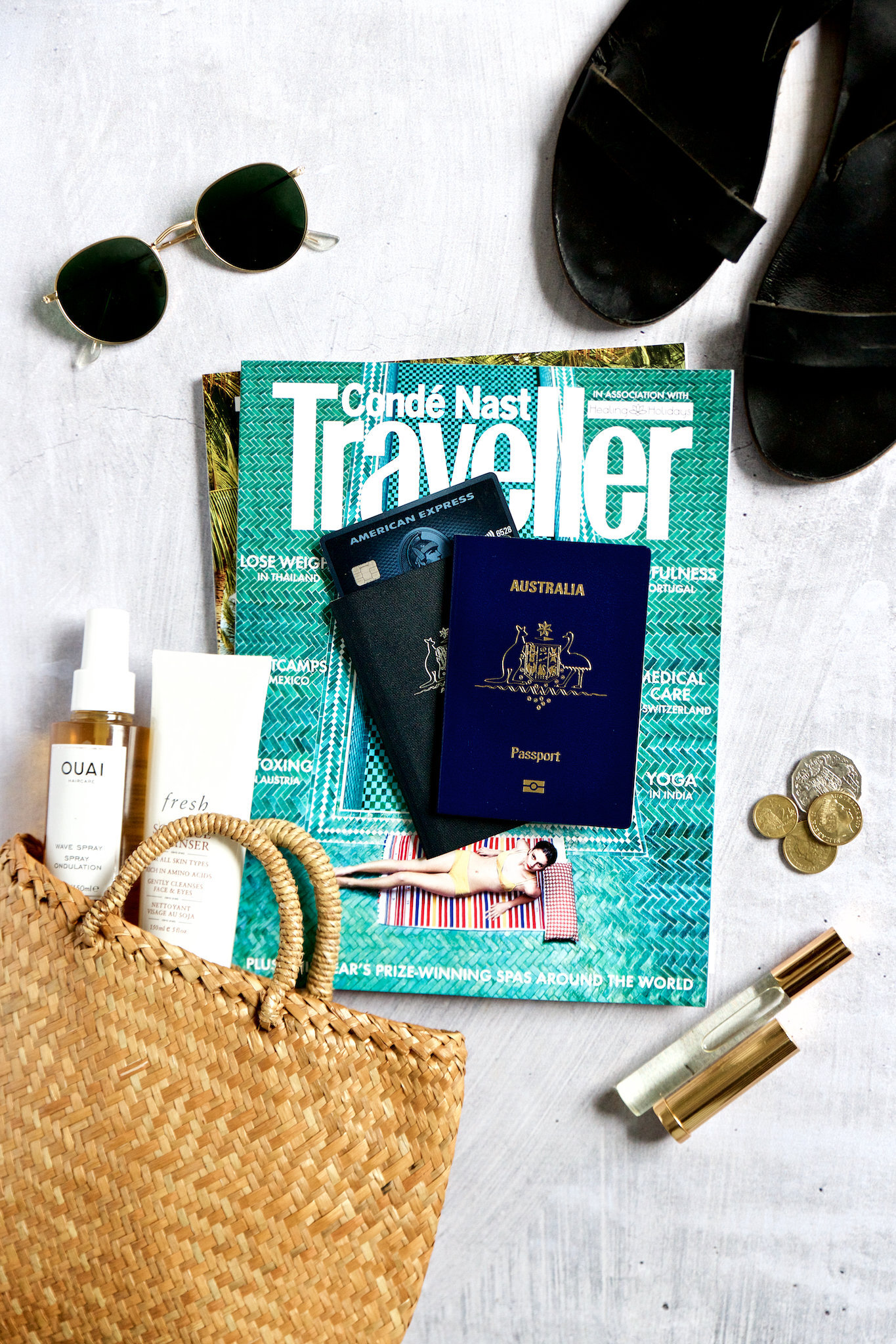 Chelsea Loren product photographer for flat lays featuring magazines travel accessories adventure