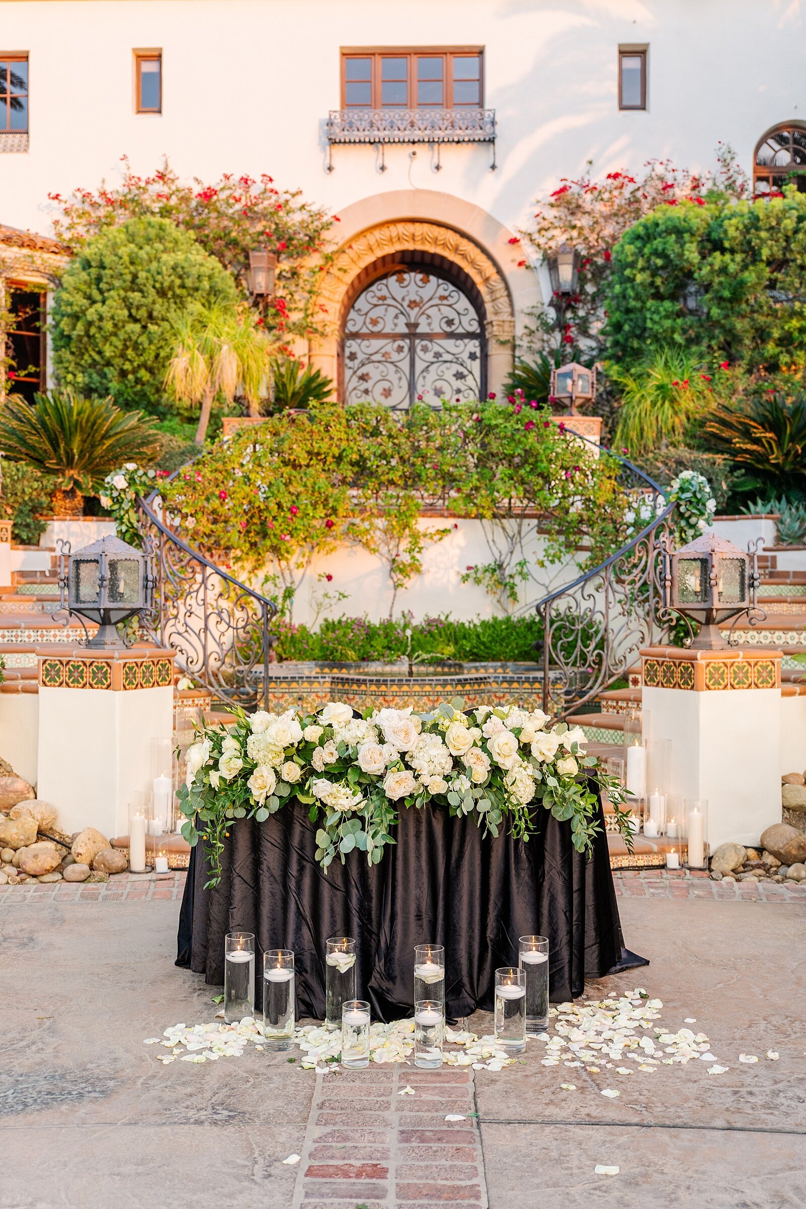 Sweetheart table at Hummingbird Nest Ranch in Santa Susana by wedding photographer and videographer, Sherr Weddings.