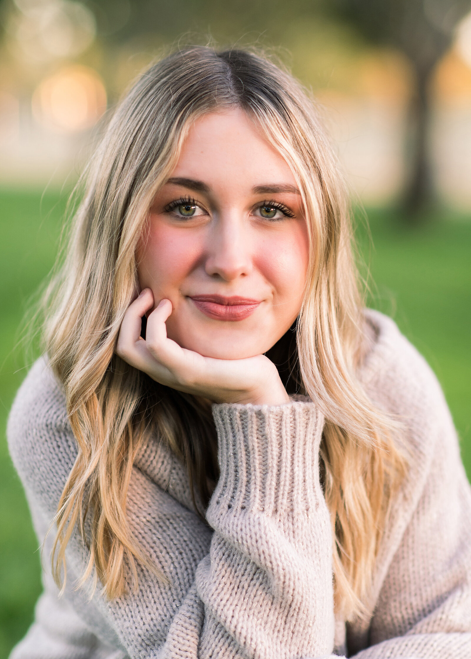 Senior girl posing for graduation portrait in gilbert az by the silios