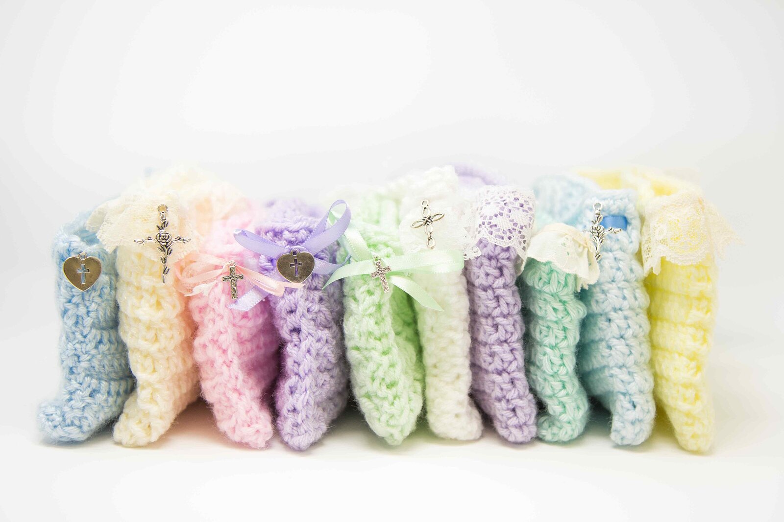 bundle of knit and crochet cradles for stillborn babies