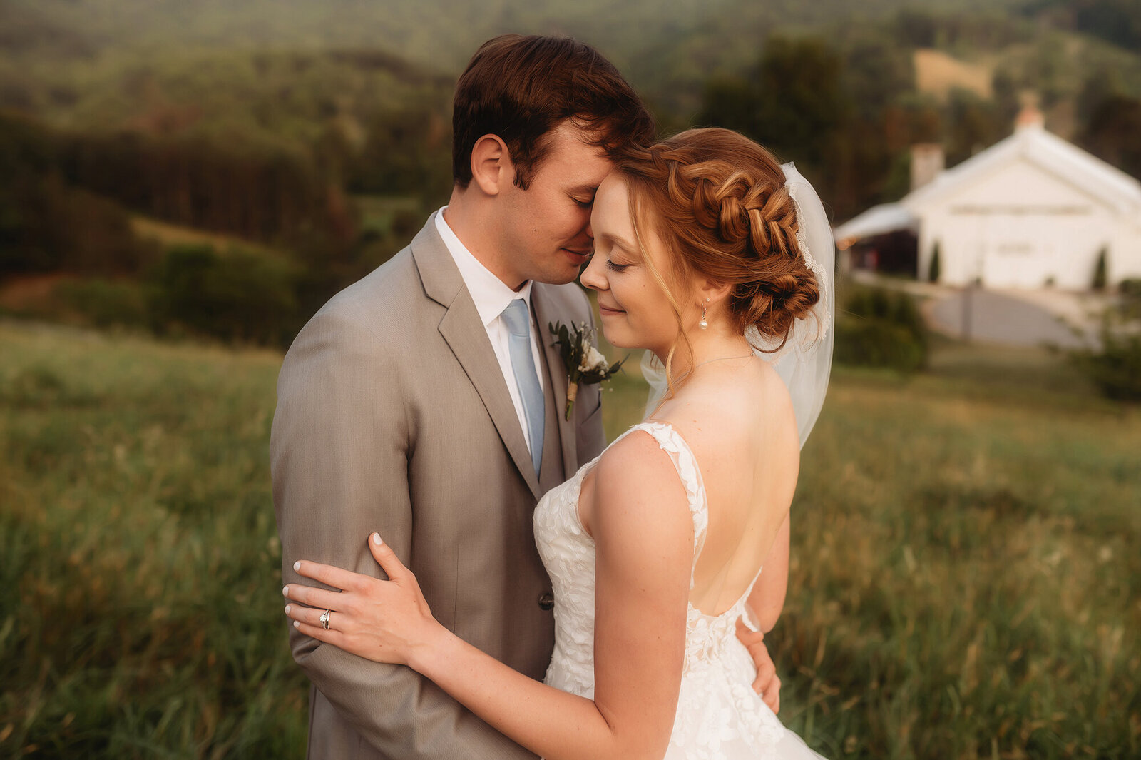 Newlyweds pose for Wedding Photos at Chestnut Ridge Events in Asheville, NC.