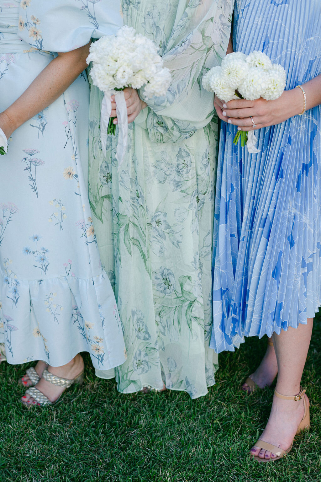 bridesmaids in floral pattern dresses for a beach wedding in Florida