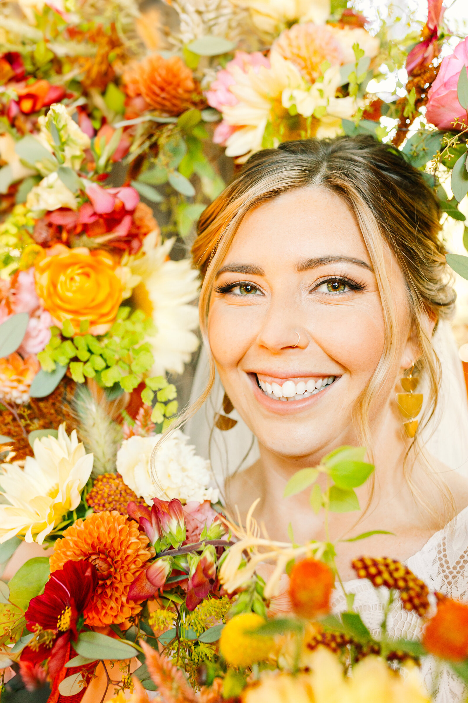 Bride on her colorful wedding day in Santa Cruz, California in the redwood trees.