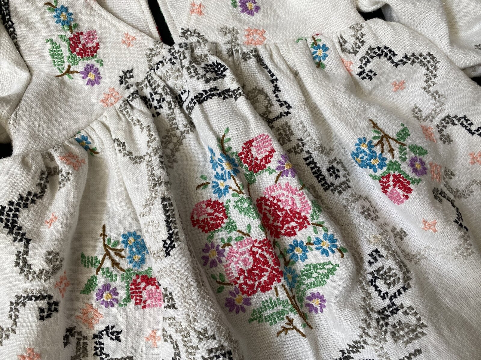 Baby dress made out of vintage cross stitched linens