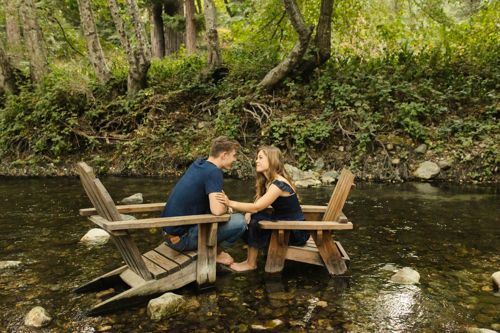 A couple poses for their engagement photos in Big Sur, California.