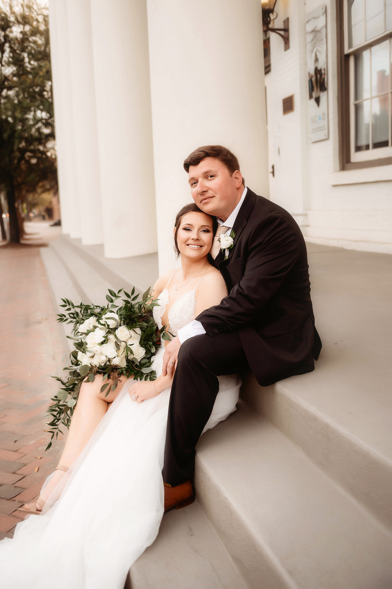 Newlyweds pose for portraits after their Micro Wedding in Savannah, Georgia.