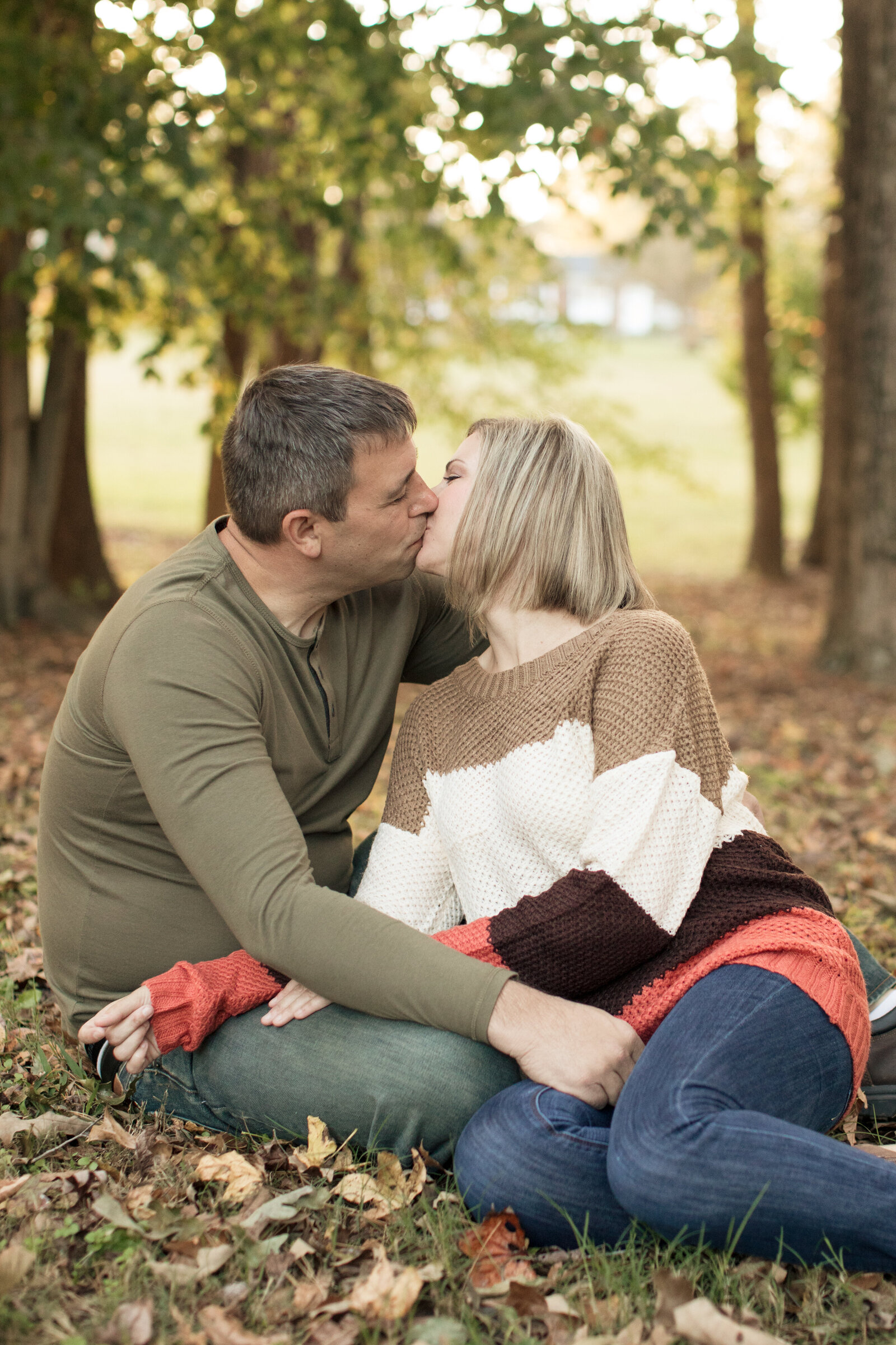 husband and wife kissing