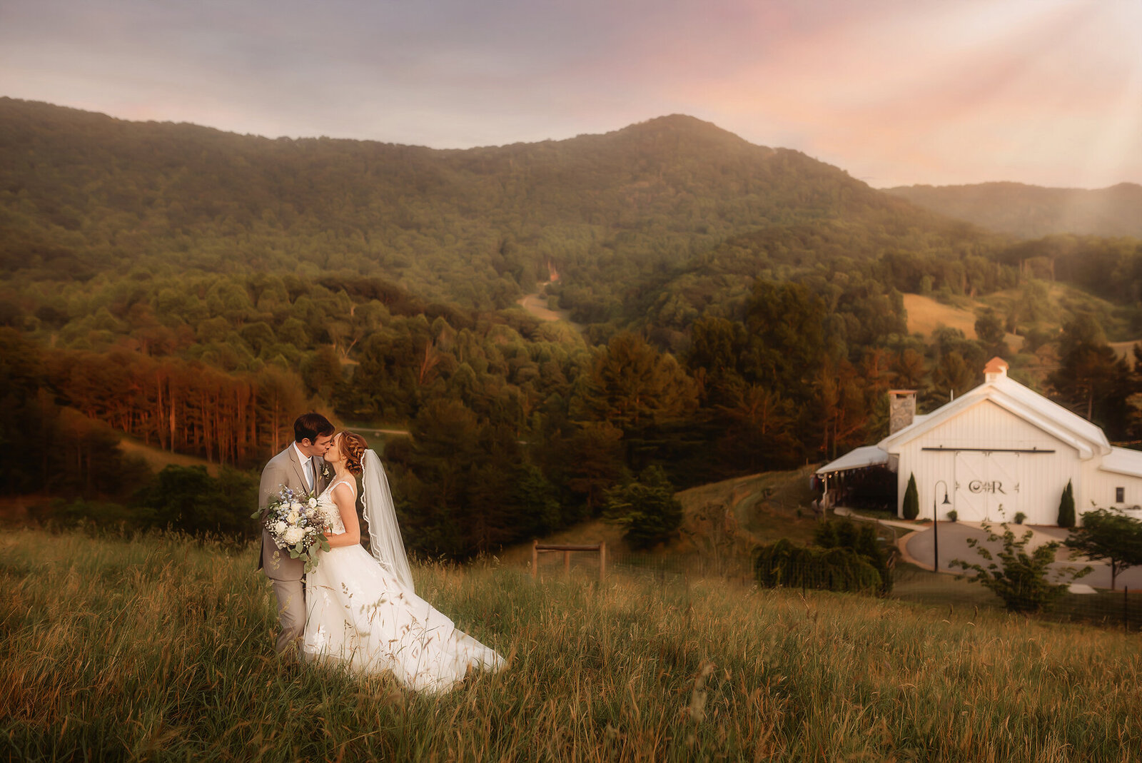 Newlyweds pose for Wedding Photos at Chestnut Ridge Events in Asheville, NC.