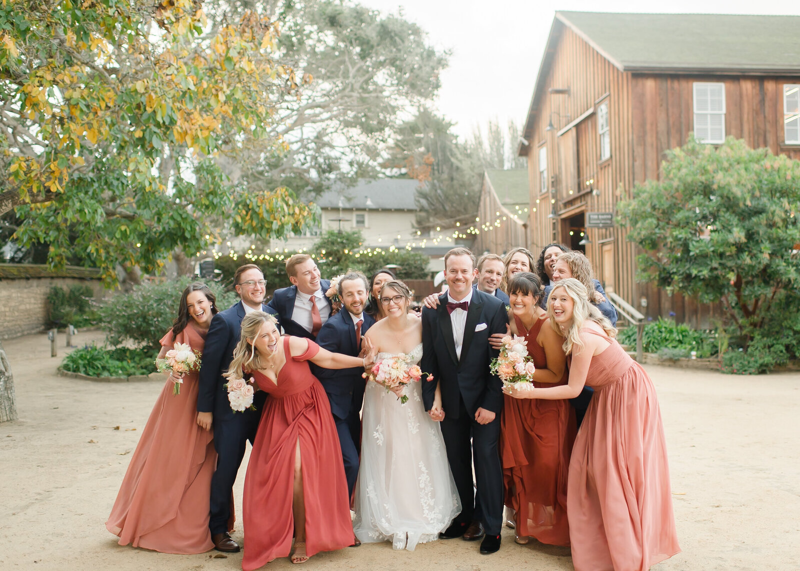 wedding party photo in front of the barns in monterey 