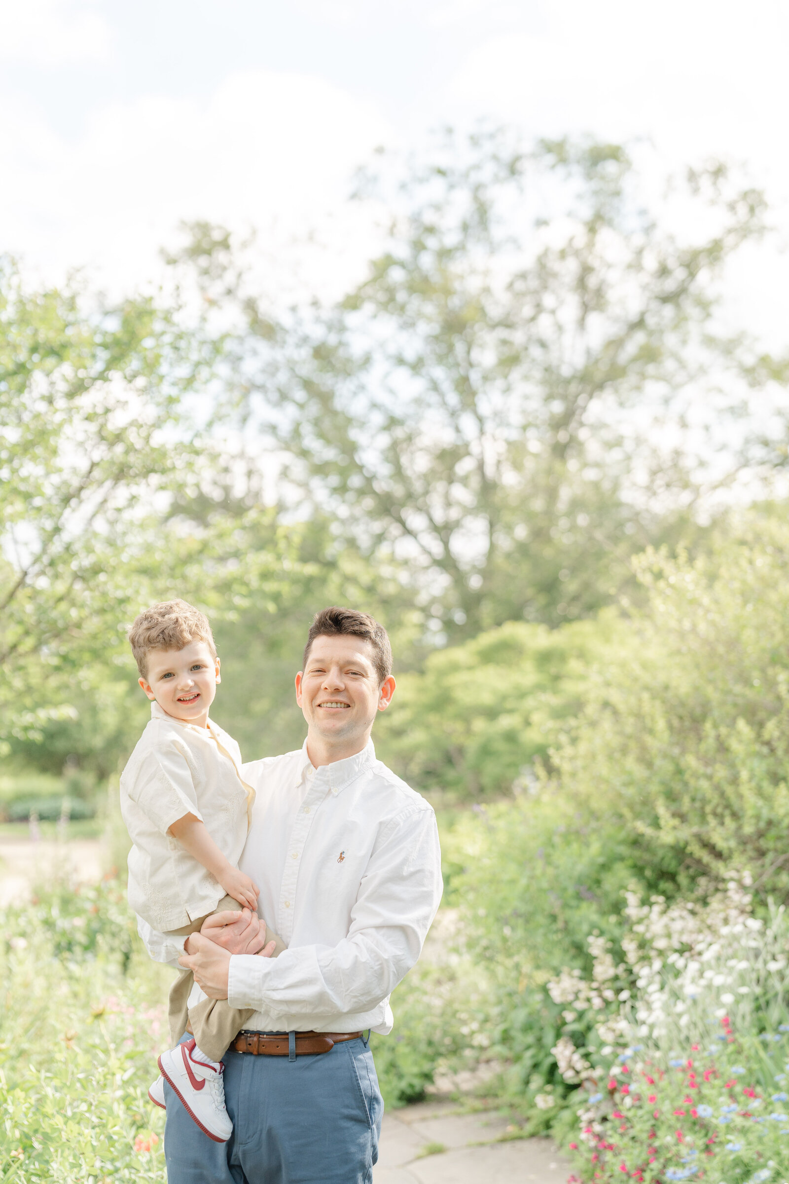 dad and son pose for photo during Fairfax County, Virginia family session