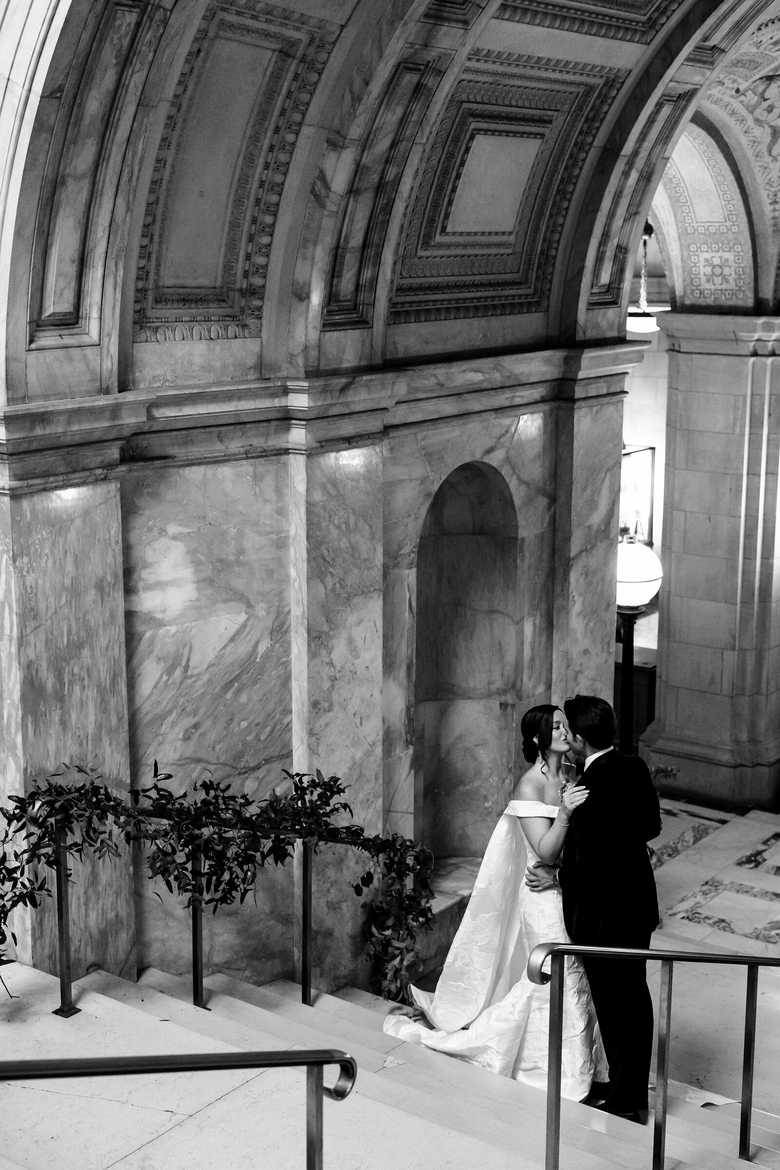 boston-public-library-wedding-couple-on-stairs.lisa-gilbert-photography