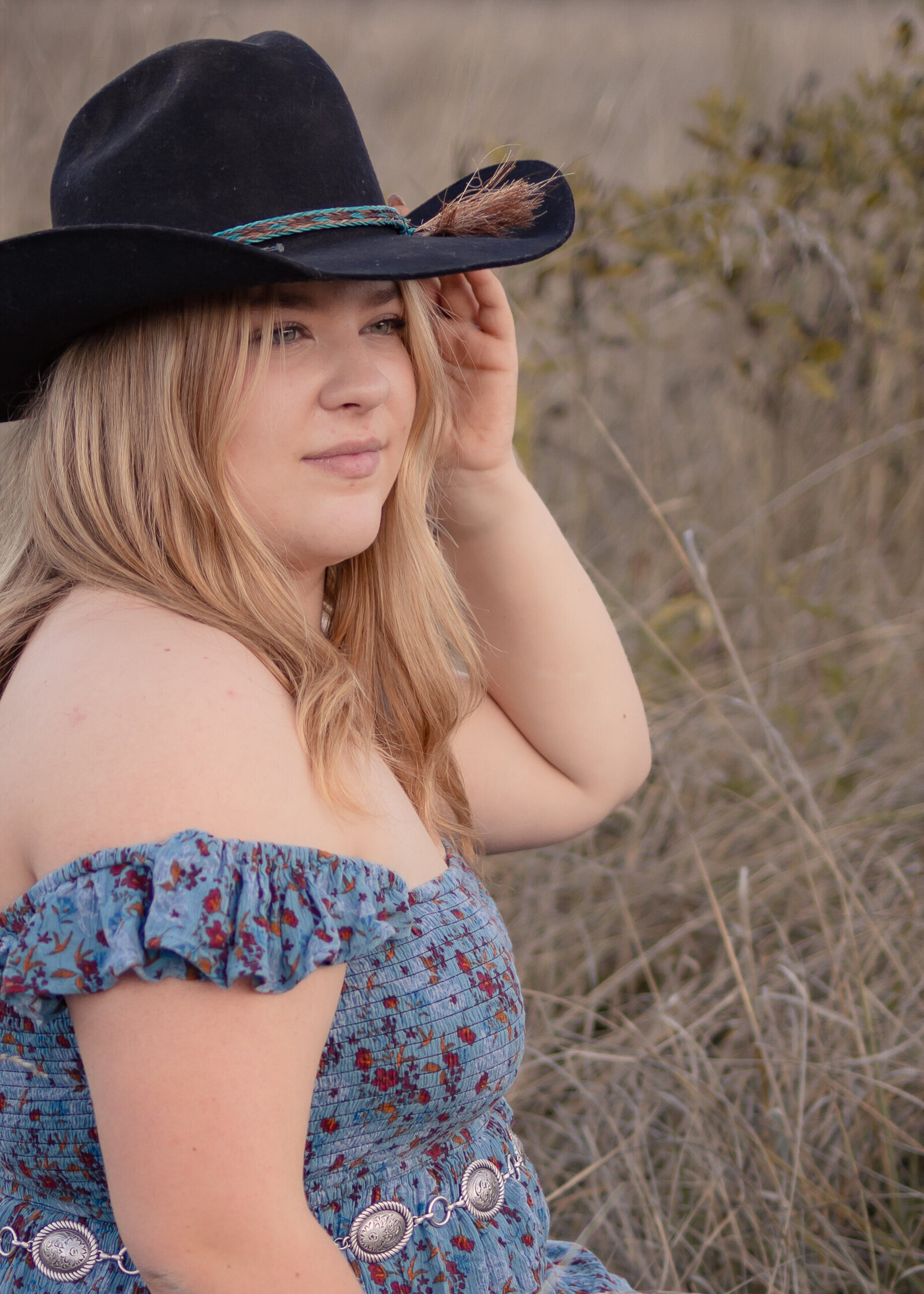 Girl wearing a cowgirl hat gazing in to the distance Milo Mciver Park, Estacada Oregon