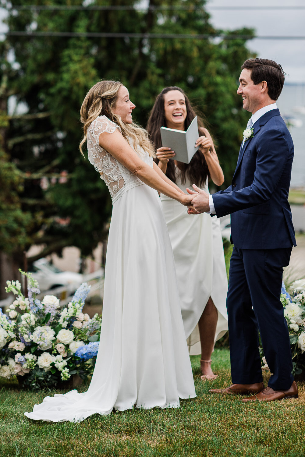 bride and groom pronounced married excited