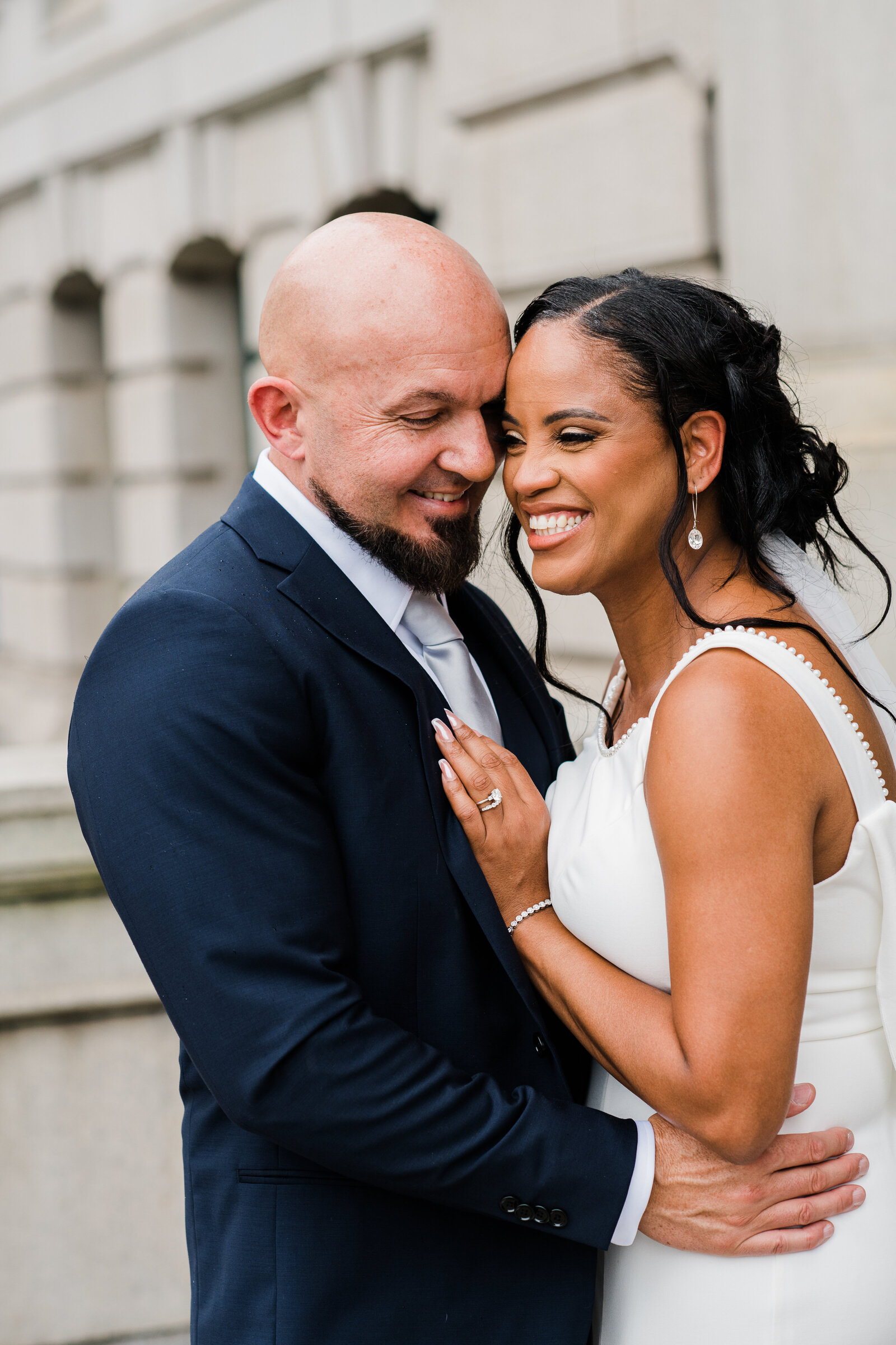 couple embrace and smile