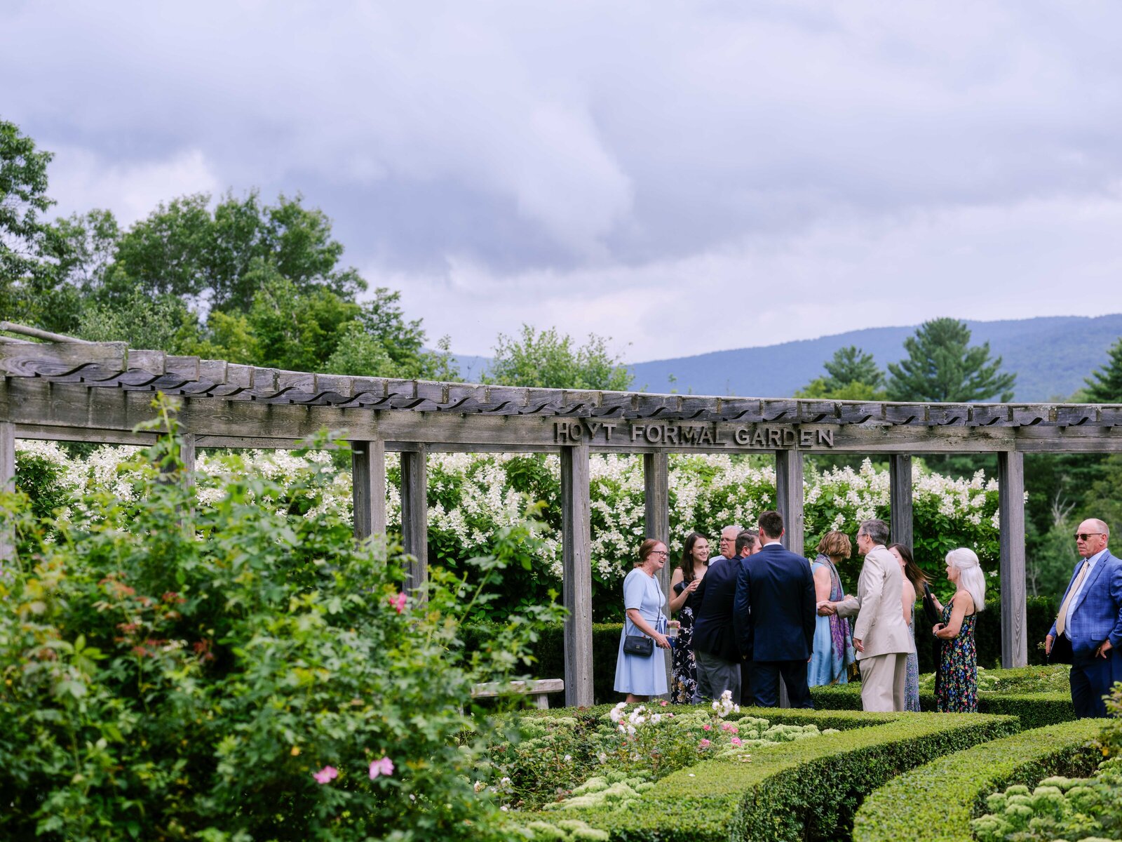 Wedding guests relax in Hildene's formal garden
