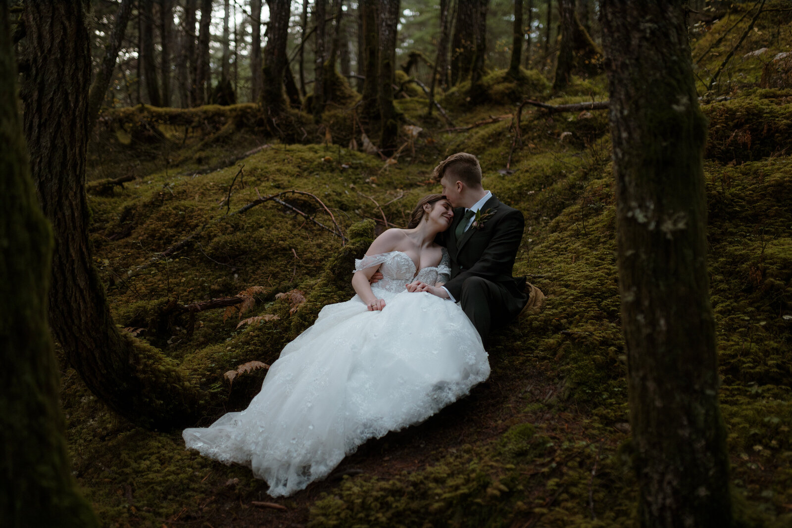 Bride and groom in forest Girdwood Alaska Wedding