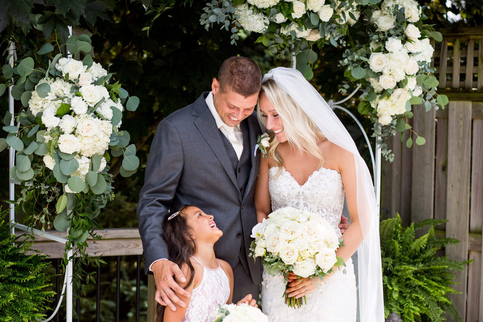Intimate backyard wedding with floral arch  n Komoka Ontario
