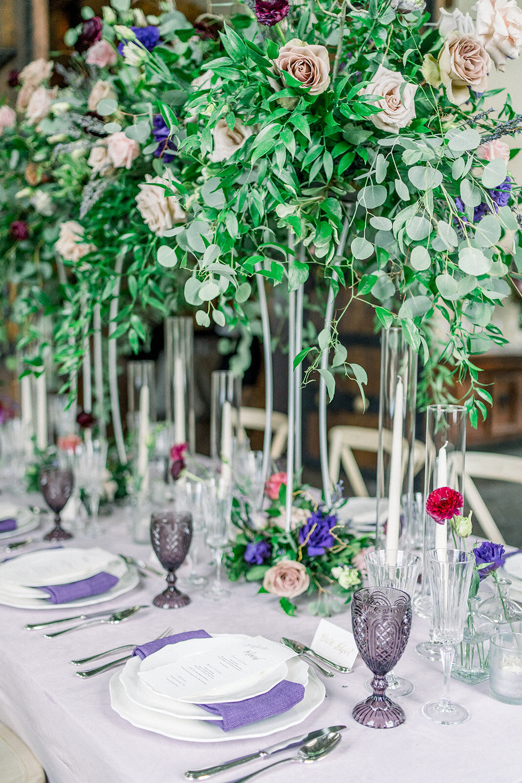 Purple wedding reception table at White Swan Castle wedding in Granite Bay, CA